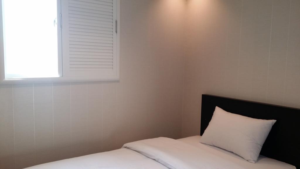 New Suwon Hotel Quarto foto