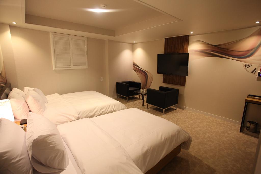 New Suwon Hotel Quarto foto