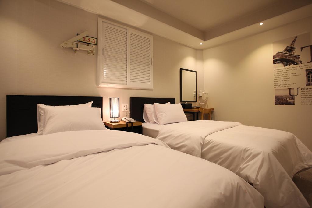 New Suwon Hotel Quarto foto